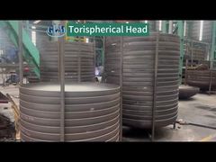 Torispherical head formed by integral stamping