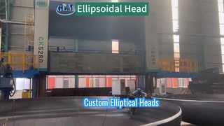 Custom-made large carbon steel elliptical heads, with grinding and beveling.